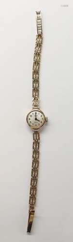 Lady's 9ct gold Rotary wristwatch with circular dial, button-winding and the 9ct gold chevron-cut