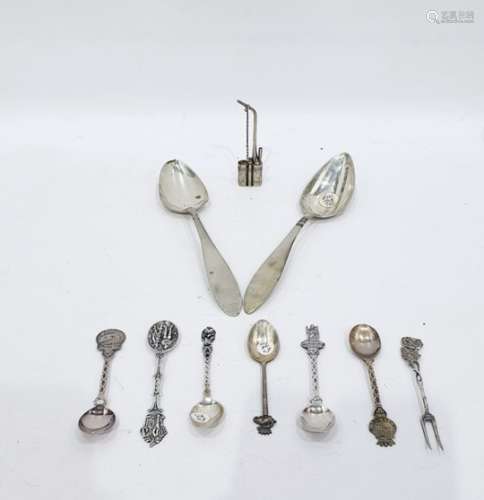 White metal souvenir spoon, six others, a small white metal Chinese pipe and a pair of tablespoon,