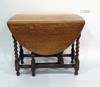 20th century oak gateleg dining table on barleytwist supports and stretchered base, three beech-