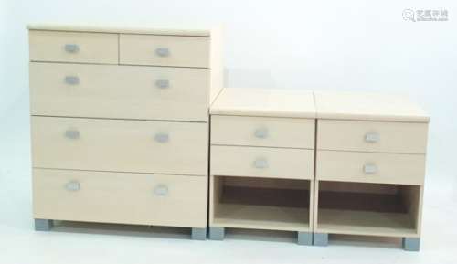 Suite of bedroom furniture to include bedside cabinets and two chests of two short over three long