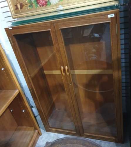 20th century teak display cabinet, two glazed doors, glass shelves, 89cm x 131.5cm
