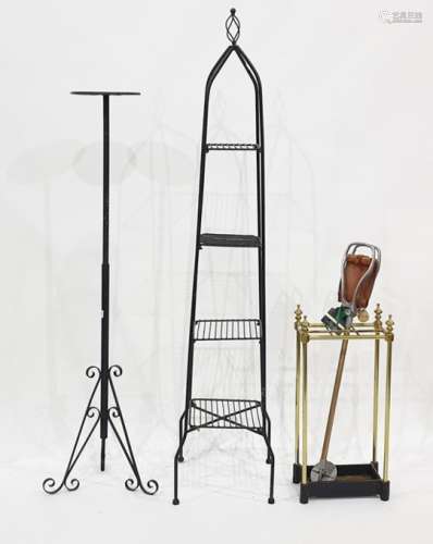 Assorted metalware to include brass umbrella stand, pan rack, adjustable torchere and a shooting