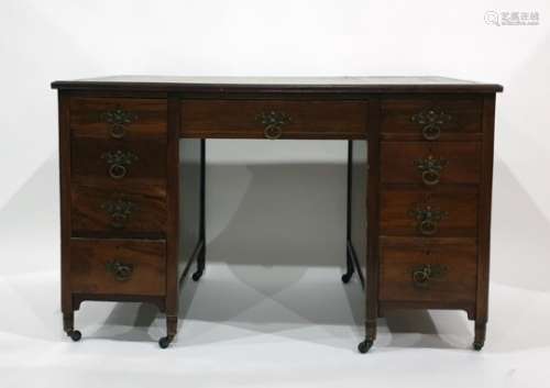 Early 20th century mahogany desk with green leatherette inset top, nine assorted drawers, raised