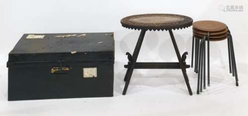 19th century carved oak oval top table on trestle-style supports, a tin trunk and a set of four
