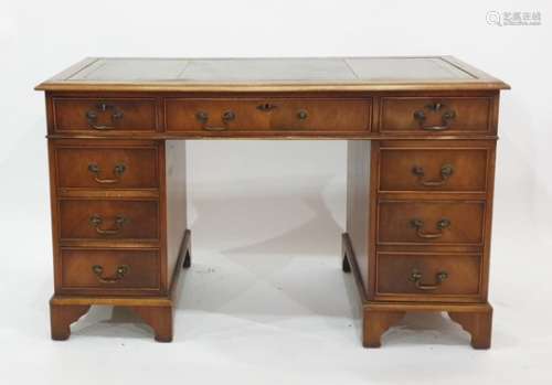 19th century mahogany pedestal desk with green leather inset top, nine assorted drawers, raised on