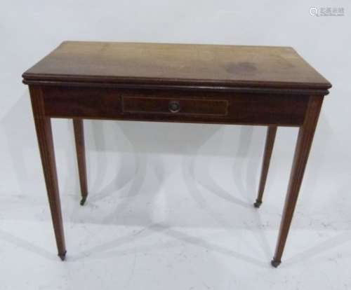 19th century mahogany tea table, the fold-over top above single drawer, on reeded tapering supports,