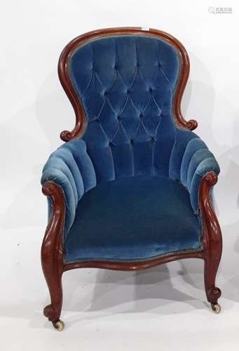 Victorian armchair in blue ground button-back upholstery, serpentine front rail, cabriole supports