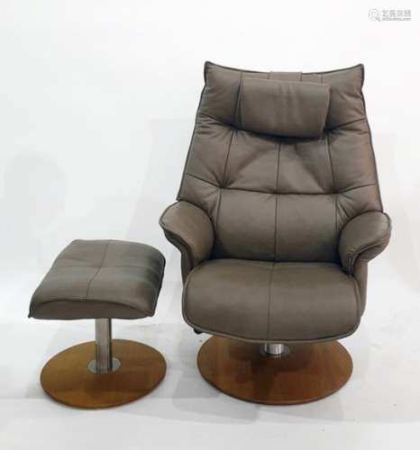 Zedere easy armchair and matching footstool in a grey leather upholstered finish