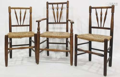 Set of seven (5+2) circa 1920's dining chairs, the three turned spindle back splaying outwards to