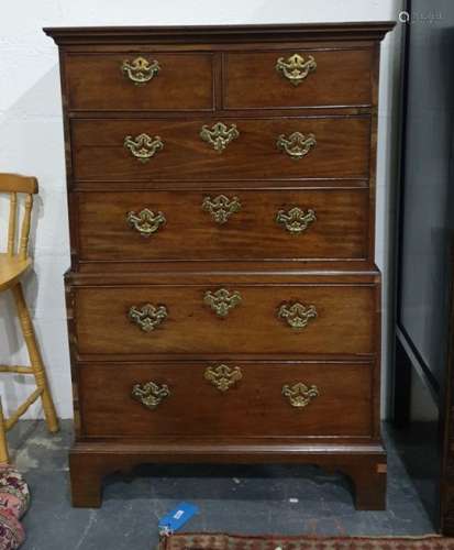 Georgian mahogany chest on chest with moulded cornice above two short and two long drawers, on a