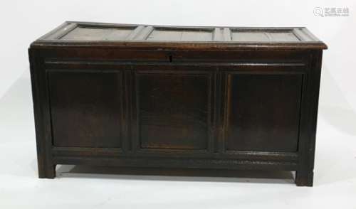 18th century oak coffer with three panelled lid and front, on stile supports