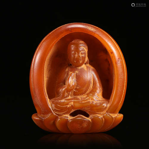 CHINESE RED AMBER SEATED BUDDHA IN NICHE