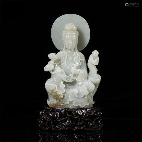 CHINESE CELADON JADE SEATED GUANYIN