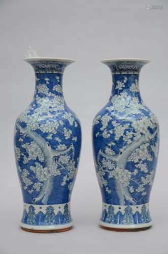 A pair of Chinese vases in blue and white porcelain 'prunus blossoms' (*) (59cm)