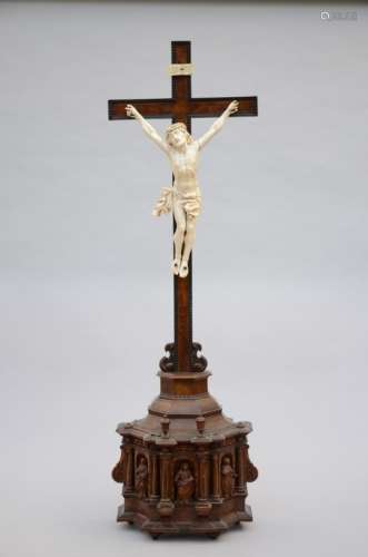 A large ivory corpus on a walnut base (120cm)