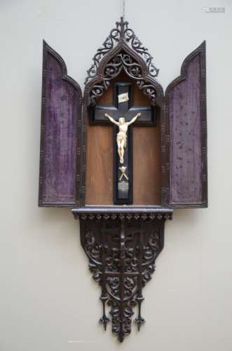 A Gothic revival shrine with ivory corpus, dated 1887 * (34x108cm)