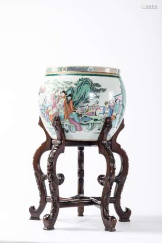 A fish bowl in Chinese famille rose porcelain 'Taoist scene', with an ironwood base (41x39cm)