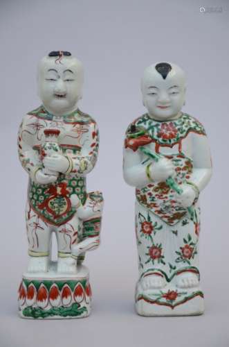 A pair of hÈhÈ statues in Chinese porcelain, Kangxi period (*) (33cm)