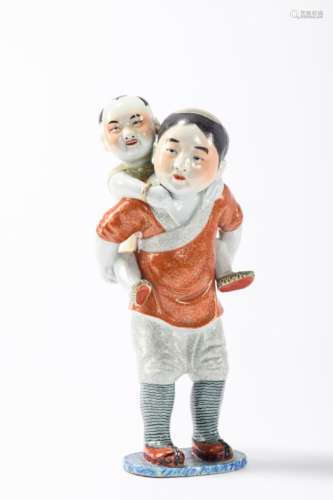A sculpture in Chinese porcelain 'boys' (*) (43cm)