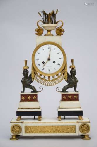 A Louis XVI marble and bronze clock, signed Honin ‡ LiËge (11x36x57cm)