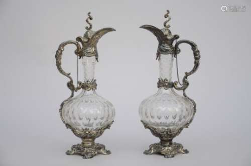 A pair of cristal jugs with silverplated mounts (38cm)