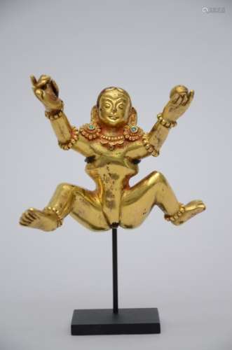 A Tibetan gilt bronze sculpture 'Dakini' (12x9cm)