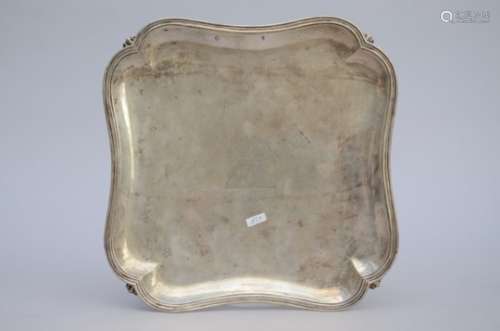 A silver armorial tray, probably Augsburg 18th century (29x29cm)
