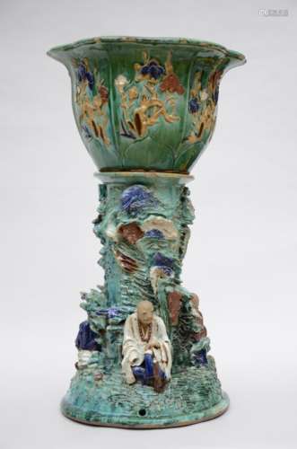 A large planter on stand in Shiwan ware (*) (89cm)
