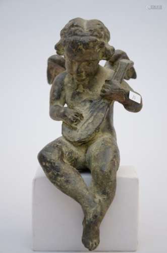 A bronze sculpture 'an angel playing music' (23cm)