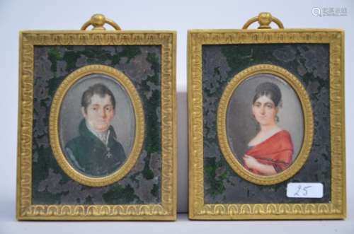 A pair of miniatures on ivory 'portraits' with a bronze frame, 19th century (4x6cm)