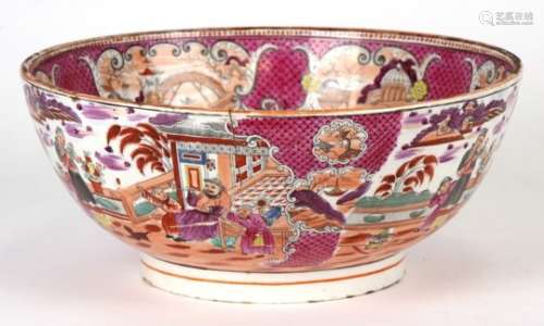 A 19th century porcelain bowl with chinoiserie decoration, 27cms (10.5ins) diameter (a/f).