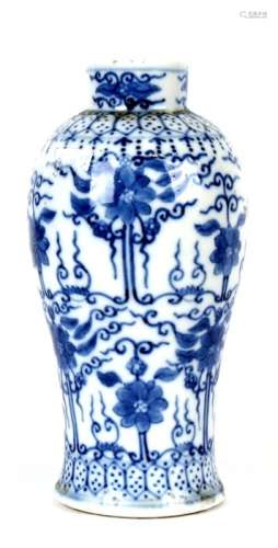 A Chinese blue & white vase decorated with flowers and foliate scrolls, four character blue mark