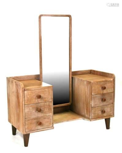 A Gordon Russell oak twin-pedestal dressing chest with central rectangular mirror flanked by six