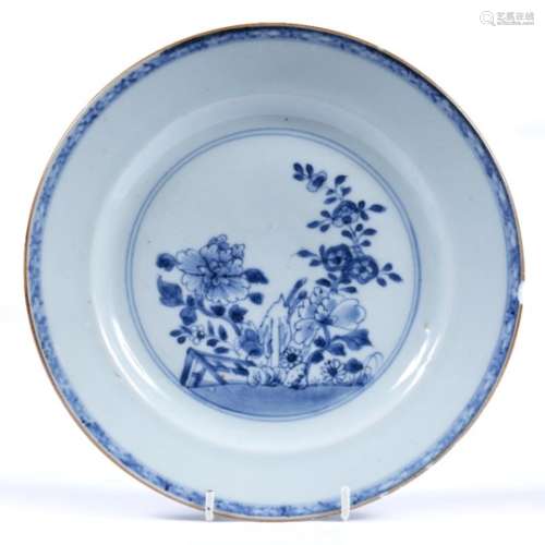 Blue and white dish Chinese, 18th Century decorated to the centre depicting flowers in a garden 23cm