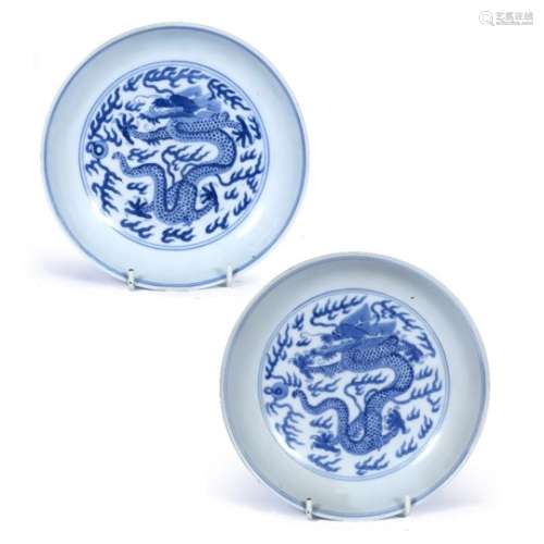 Pair of blue and white dragon saucers Chinese, 19th/20th Century the front decorated in a roundel