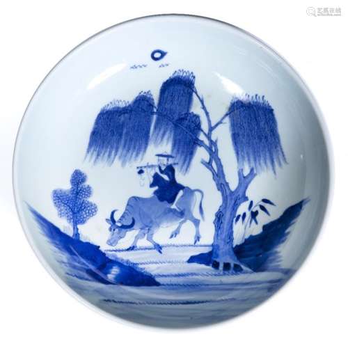 Blue and white dish Chinese, 19th Century depicting a musician sitting astride an oxen beneath a