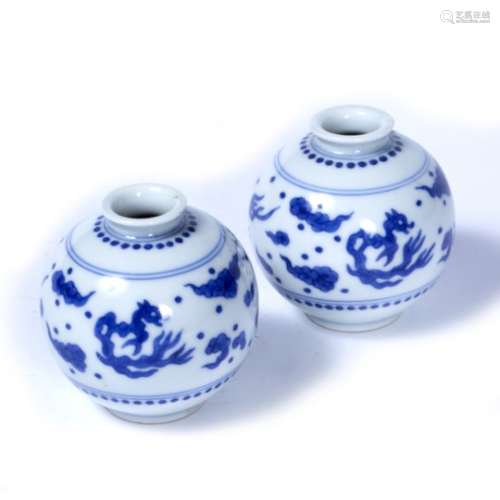 Pair of blue and white jarlets Chinese, 18th Century decorated to the outside with dragons in flight