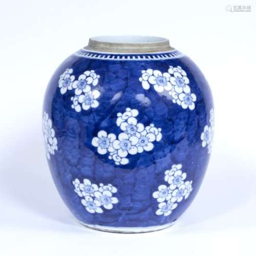 Blue and white ginger jar Chinese, 19th Century decorated with prunus flowers against a crackle blue