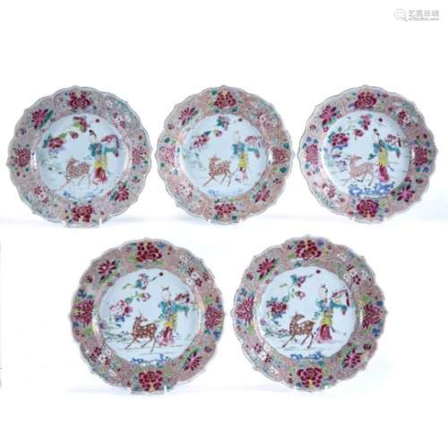 Five famille rose plates Chinese, late 18th Century decorated to the centre with a figure in a