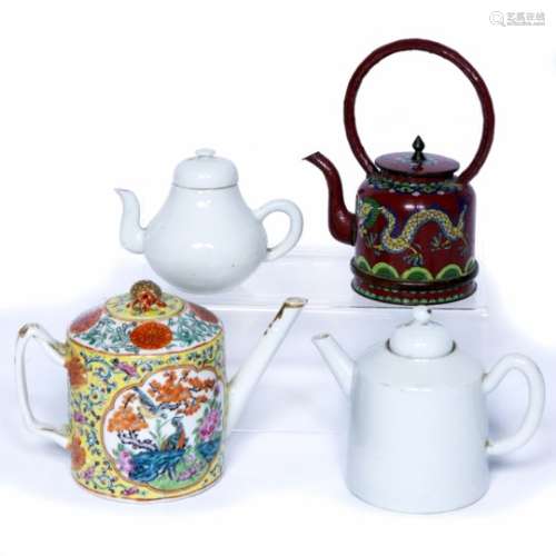 Two undecorated white glazed teapots Chinese, Jingdezhen largest 11cm a yellow ground Chinese