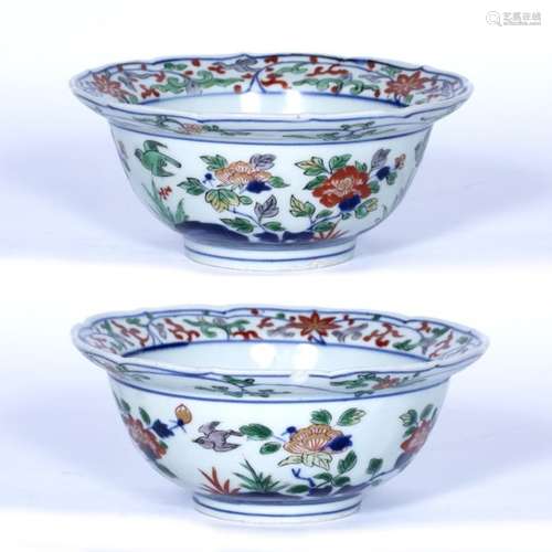 Pair of Wucai bowls with flared rims Chinese, 19th Century decorated with rocks from which flowers