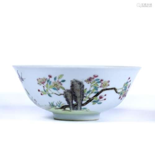 Famille rose bowl Chinese, 19th Century decorated to one side with a tall rock behind which a tree