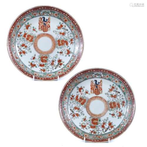 Pair of armorial dishes French porcelain in the Chinese style, decorated with birds and flowering