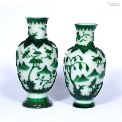 Two similar Peking glass vases Chinese, 19th/early 20th Century each overlaid in green with a