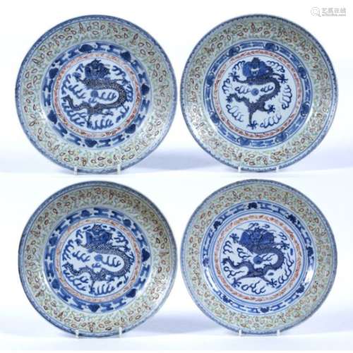 Blue and white dragon porcelain plates Chinese, 19th Century each with enamel polychrome border,