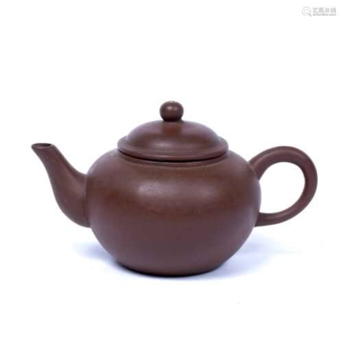 Yixing teapot Chinese ,20th Century of plain form with impressed marks to base 8cm high x 12cm