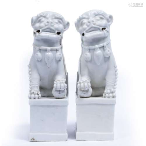 Pair of Dehua porcelain models of dogs of fo Chinese, 18th Century both modelled seated with open