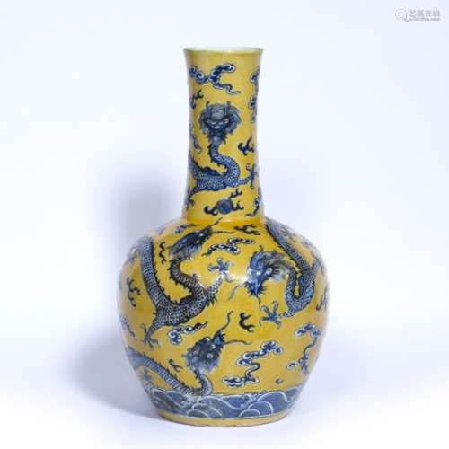 Moulded yellow ground vase Chinese, 19th Century decorated in ground yellow with blue dragons all