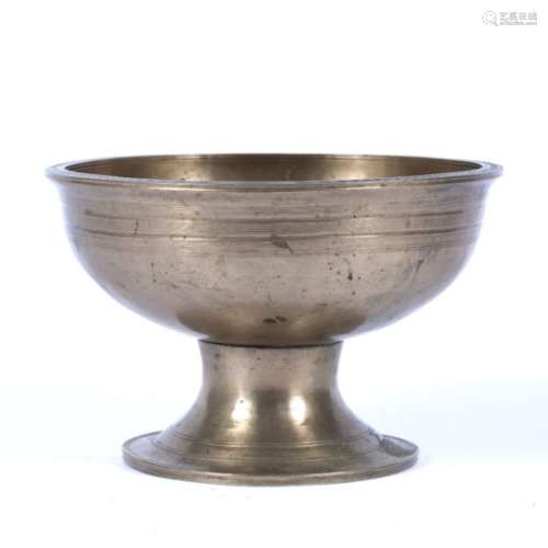 Footed singing bowl Tibetan, 18th/19th Century engraved to the sides with concentric lines, on one