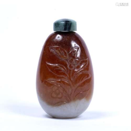 White and rust red jade snuff bottle Chinese, 19th Century of tapered ovoid form, carved in low